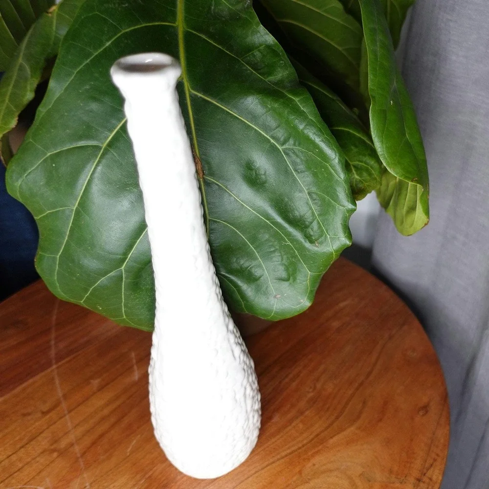 White vase with long neck and‎ gourd like ribbed textured